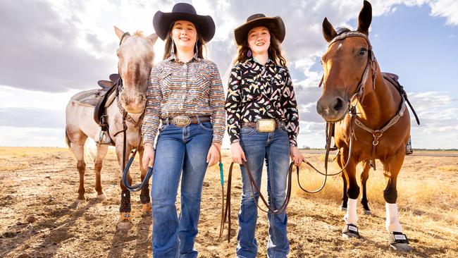 Longreach girls Tyler, 12, and Jacy Morton, 13, are ready for the Mount Isa Rodeo. Photo: Aaron Skin