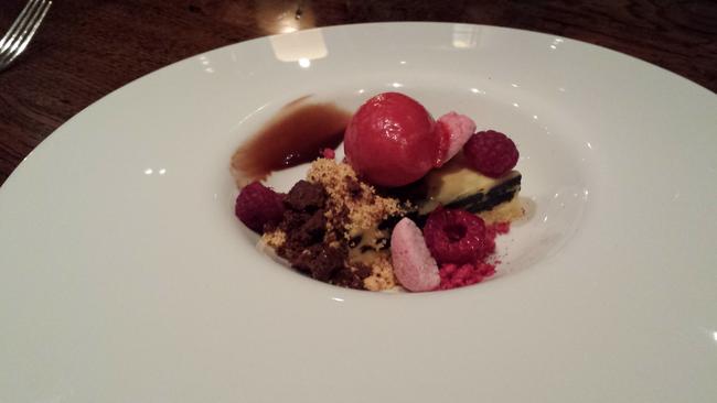 Oreo cheesecake with Black Doris plum jam, brown butter and cocoa crumble, raspberry marshmallow and sorbet.