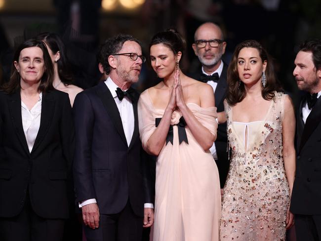 Screenwriter Tricia Cooke, director Ethan Coen, actress Margaret Qualley, actress Aubrey Plaza and actor Charlie Day in Cannes. Picture: AP