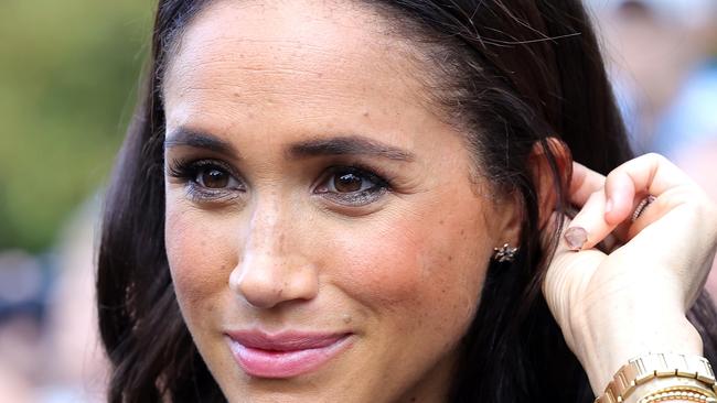 WINDSOR, ENGLAND - SEPTEMBER 10: Meghan, Duchess of Sussex meets members of the public on the long Walk at Windsor Castle after viewing flowers and tributes to HM Queen Elizabeth on September 10, 2022 in Windsor, England. Crowds have gathered and tributes left at the gates of Windsor Castle to Queen Elizabeth II, who died at Balmoral Castle on 8 September, 2022. (Photo by Chris Jackson/Getty Images)