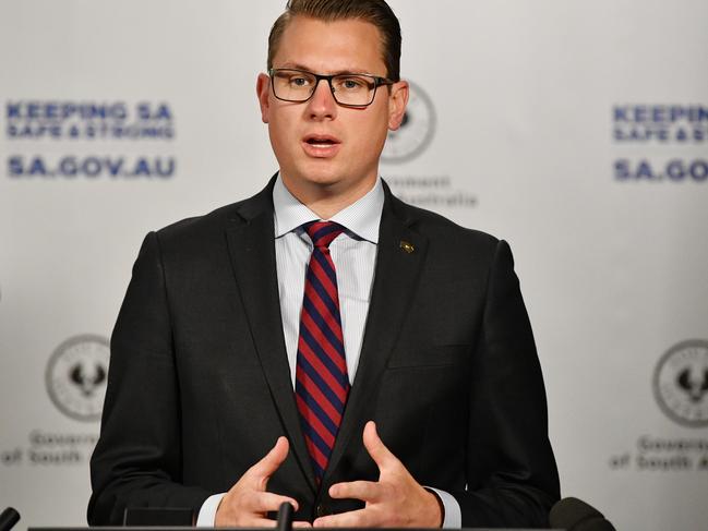 SA Minister for Transport and Infrastructure Stephan Knoll speaks to the media in Adelaide, Friday, May 29, 2020. The Australian Government is slowly reducing restrictions to boost the economy as the number of cases coronavirus cases decline. (AAP Image/David Mariuz) NO ARCHIVING