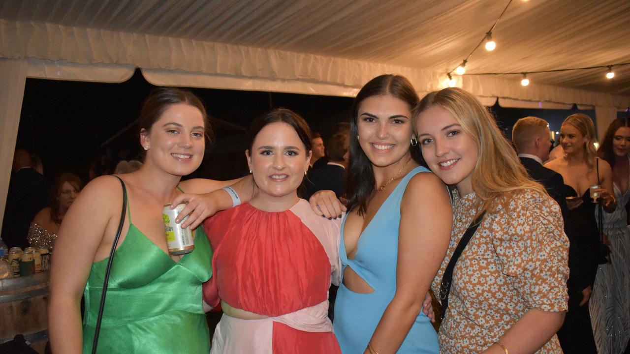 Tess Murphy of Brisbane, Meghan Wilson of Proserpine, Ellise Logan of Brisbane, and Sophie Roderick of Airlie Beach at the 2021 Proserpine Show Ball. Picture: Kirra Grimes.