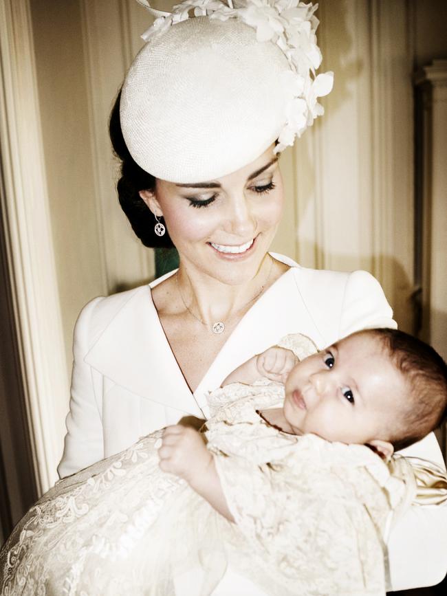 Duchess of Cambridge and her daughter Princess Charlotte of Cambridge pose for a photo in the Drawing Room at Sandringham House after the christening of Princess Charlotte of Cambridge on the Sandringham Estate on July 5, 2015 in King’s Lynn, England. Picture: Mario Testino/AP