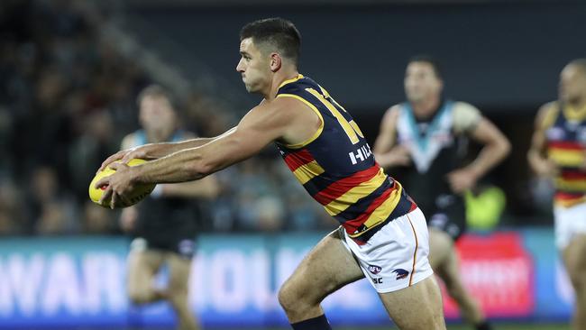 Taylor Walker unleashes during the Showdown, his most recent game for the Crows. Picture: Sarah Reed