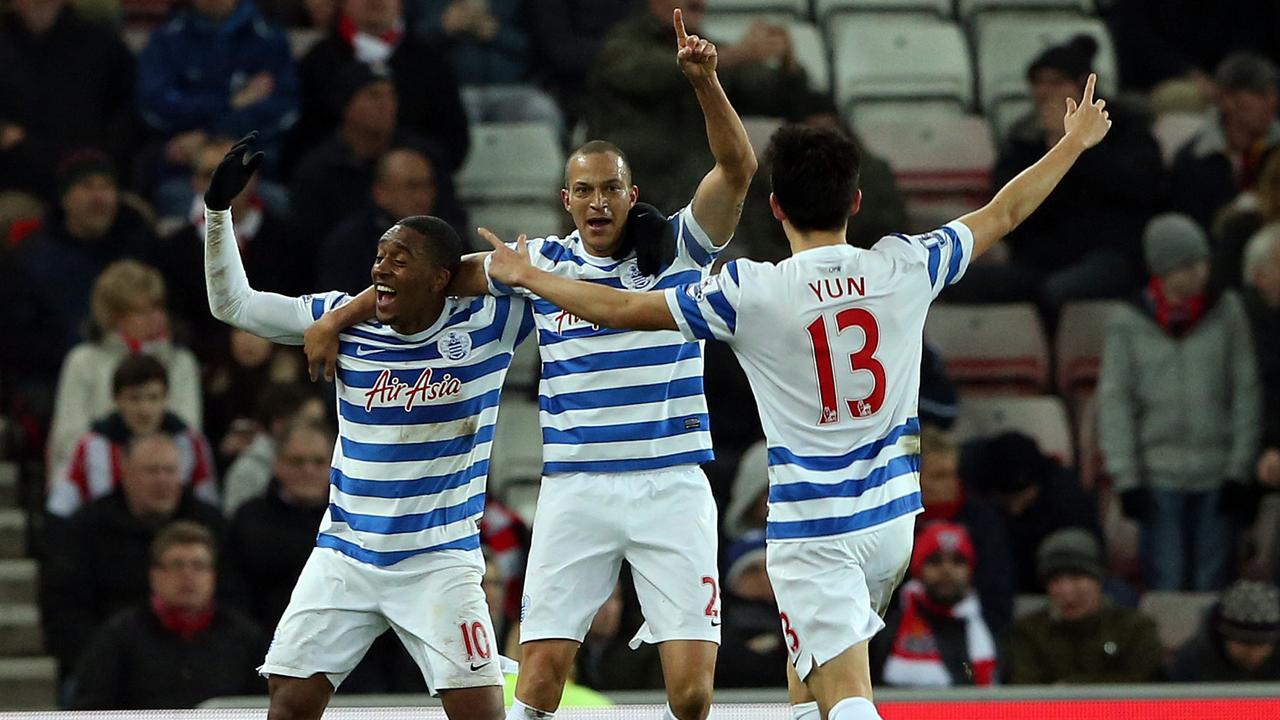 Queens Park Rangers' Bobby Zamora, center, celebrates his goal with his teammates during their English Premier League soccer match between Sunderland and Queens Park Rangers at the Stadium of Light, Sunderland, England, Tuesday, Feb. 10, 2015. (AP Photo/Scott Heppell)