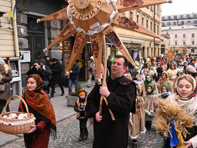 Civilians celebrate Orthodox Christmas Eve in the western Ukrainian city of Lviv. Picture: AFP