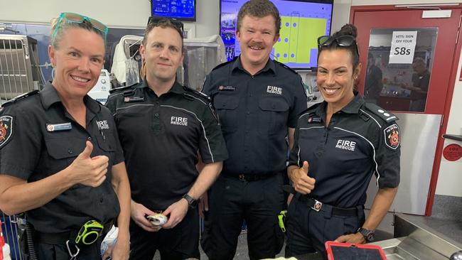 Firefighters rescue blue-tongued lizard from decorative log. Picture: Supplied.