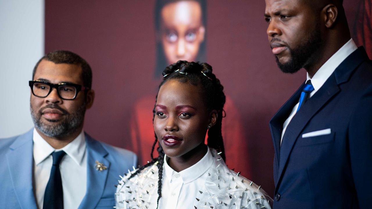 Peele with his leading stars at an Us premiere (Photo by Johannes EISELE / AFP)