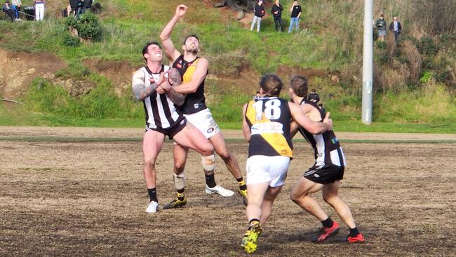 Liam Wale-Buxton and Sam Gilmore battle in the ruck. Picture: Ben Higgins