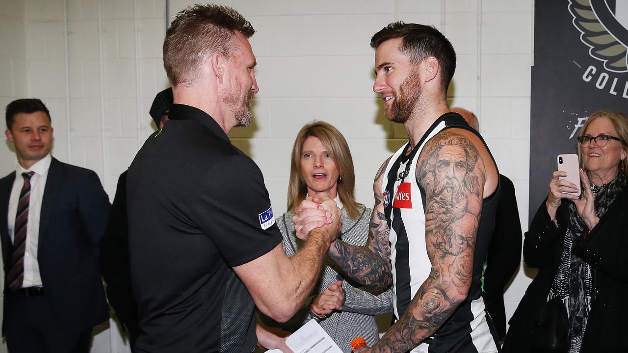 Nathan Buckley and Howe celebrate a Magpies win in 2019. Picture: Michael Dodge/Getty Images