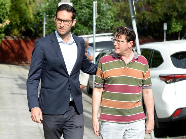 Macnamara MP Josh Burns meets people gathered outside the synagogue. Picture: Andrew Henshaw