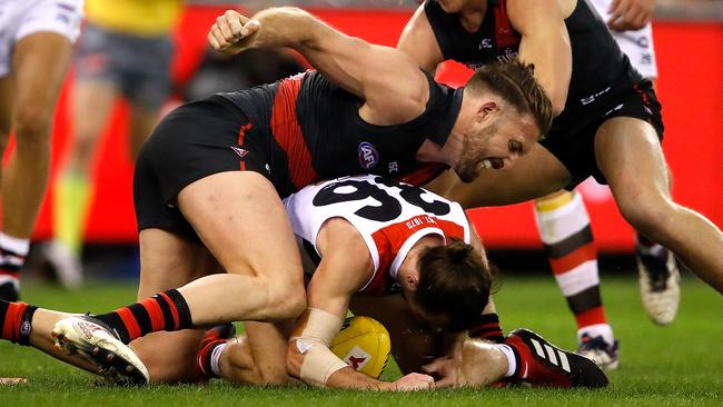 Cale Hooker swings a punch at Daniel McKenzie.