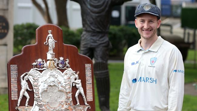 Former Easts and NSW Blues captain Peter Nevill pictured with the Sheffield Shield at the SCG. Picture by Damian Shaw