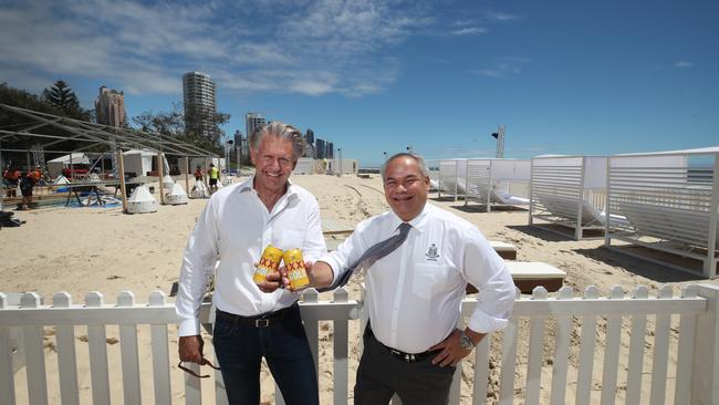 The anticipated Kurrawa Beach Club will open at Kurrawa Terrace on Saturday, 4th December.  Chair of Australian Venue Co Bob East and Gold Coast Mayor Tom Tate toast and inspect the under-construction bar . Picture Glenn Hampson