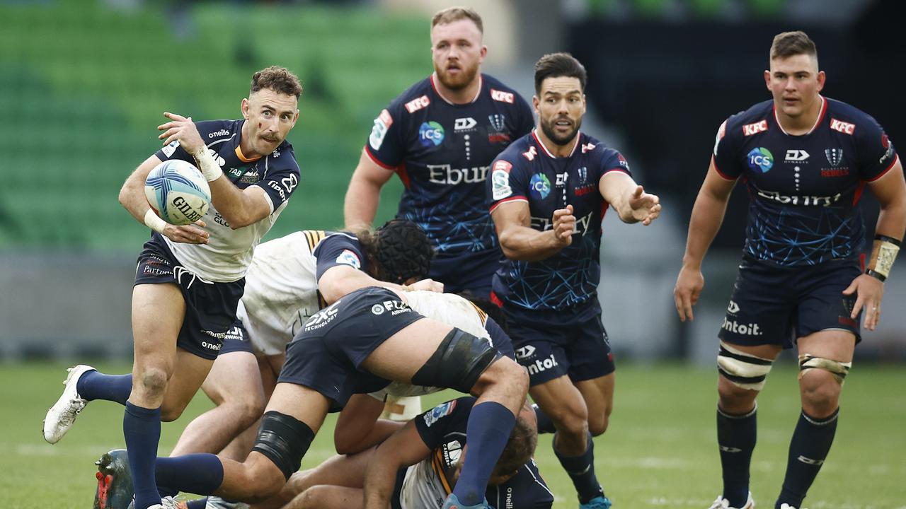 Nic White of the Brumbies passes the ball during the round 11 Super Rugby Pacific match between Melbourne Rebels and ACT Brumbies at AAMI Park, on May 07, 2023, in Melbourne, Australia. (Photo by Daniel Pockett/Getty Images)