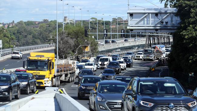 Commuter traffic coming off the Iron Cove Bridge on Victoria Rd at Rozelle, heading in to the city last week. Picture: Richard Dobson