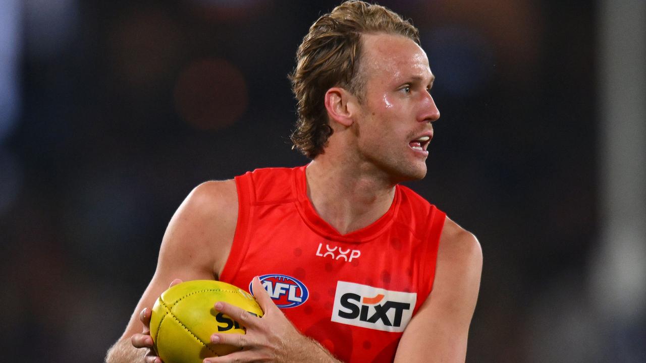 MELBOURNE, AUSTRALIA - JULY 06: Jack Lukosius of the Suns runs with the ball during the round 17 AFL match between North Melbourne Kangaroos and Gold Coast Suns at Marvel Stadium, on July 06, 2024, in Melbourne, Australia. (Photo by Morgan Hancock/AFL Photos/via Getty Images)