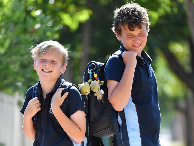 Natalie Packer’s sons Rory, 11, and Max, 9, getting ready for school. Picture: AAP/Mark Brake