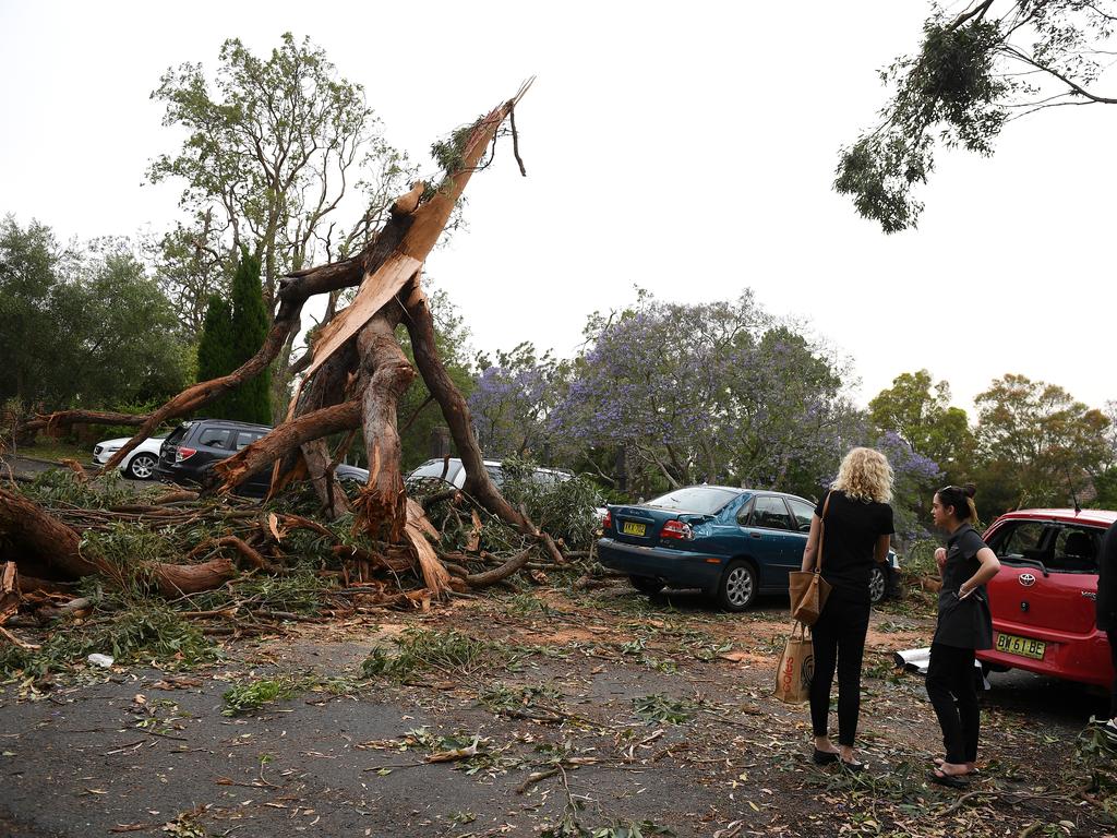 Storm damage is seen at St Johns Anglican Church, in Gordon, north of Sydney, Tuesday, November 26, 2019. A severe fast moving thunderstorm has passed over Sydney resulting in fallen trees and downed power lines in several Sydney suburbs. (AAP Image/Dan Himbrechts)