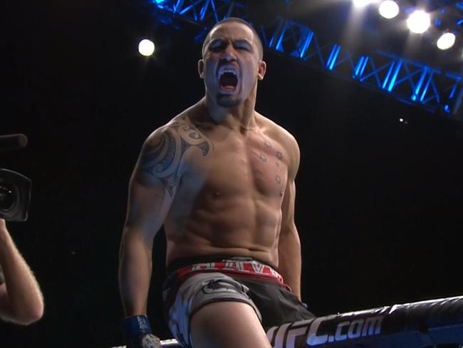 Robert Whittaker celebrates after his stunning victory.