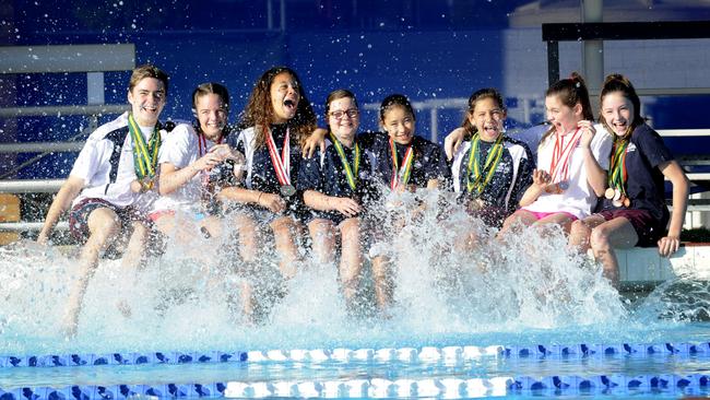 Bronte Job, far right, enjoying life with friends at Brisbane Jets swimming club. Photograph: Renae Droop