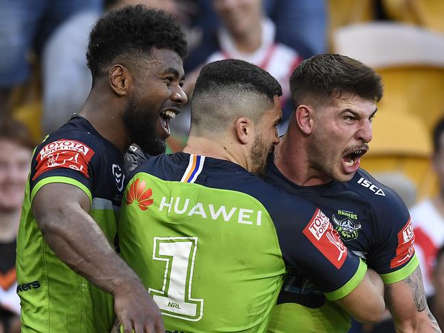 BRISBANE, AUSTRALIA - MAY 15: Curtis Scott of the Raiders celebrates with team mates after scoring a try during the round 10 NRL match between the Canterbury Bulldogs and the Canberra Raiders at Suncorp Stadium, on May 15, 2021, in Brisbane, Australia. (Photo by Albert Perez/Getty Images)