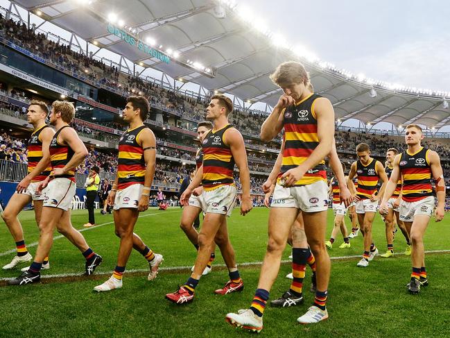 The Crows trudge off Optus Stadium after their fifth consecutive loss. Picture: Getty Images