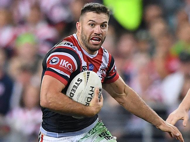 James Tedesco of the Roosters heads in to score a try during the 2019 NRL Grand Final between the Canberra Raiders and the Sydney Roosters at ANZ Stadium in Sydney, Sunday, October 6, 2019. (AAP Image/Joel Carrett) NO ARCHIVING, EDITORIAL USE ONLY