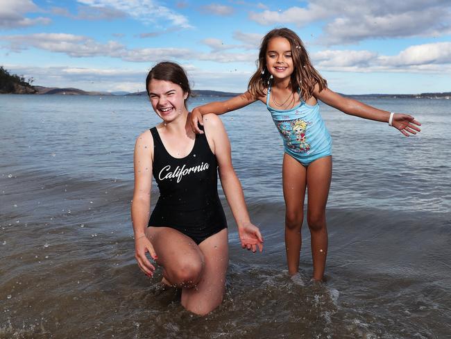 Cousins Arabella Johns, 14, and Olivia Atchison, 7, of Blackmans Bay, went to swim at Blackmans Bay but ended up at Kingston Beach. Picture: NIKKI DAVIS-JONES