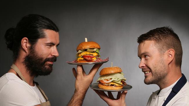 George McLean from JB &amp; Sons with his double John with bacon burger and, Nick Imgraben from Papi Chulo with his Papi Chulo burger. Picture: Troy Snook