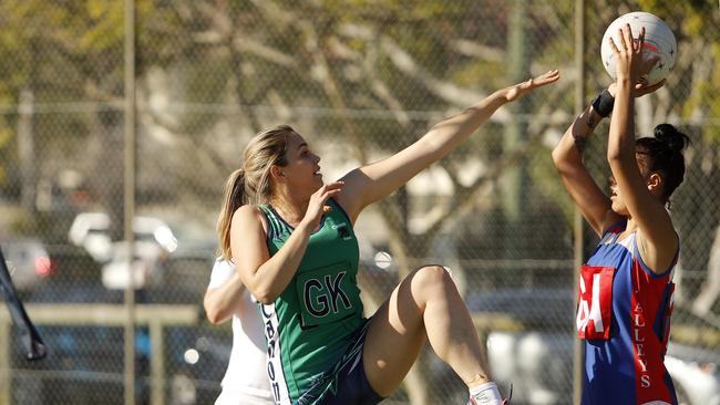 NETBALL: Alicia Nystrom from Canons Rebels Netball Club and Jenaya Graham from Valleys in action during the Downey Park Netball Association semi-final match between Valleys Netball Club and Canons Rebels Netball Club at the Downey Park Netball Association in Brisbane, Saturday, July 29, 2017. (AAP Image/Josh Woning)