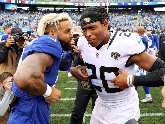 An olive branch extended: Old rivals Odell Beckham (L) of the New York Giants and the Jacksonville Jaguar’s Jalen Ramsey exchange jerseys after the game. Picture: Getty