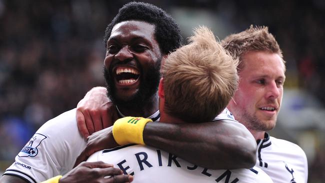 Tottenham Hotspur players celebrate Emannuel Adebayor’s goal against Aston Villa.