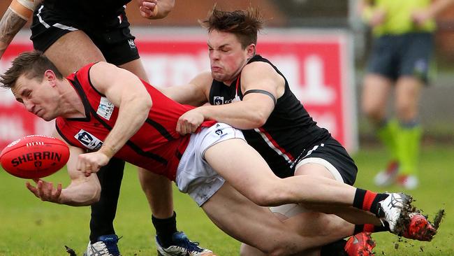 Jordan Pollard tackles Essendon’s James Polkinghorne last season. Picture: Mark Stewart