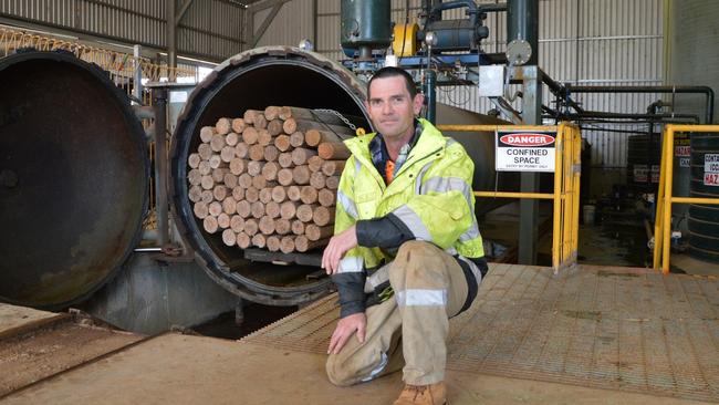 Kangaroo Island Plantation Timbers contractor Brett Haggett treating the thinned timber to be used as Fence Posts at the KIPT-owned Parndana Mill on KI. Pic Supplied