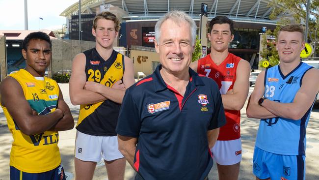 Brenton Phillips pictured in 2018 with emerging players Kysaiah Pickett, Kaine Baldwin, Karl Finlay and Joshua Shute outside Adelaide Oval. Picture: AAP/Brenton Edwards