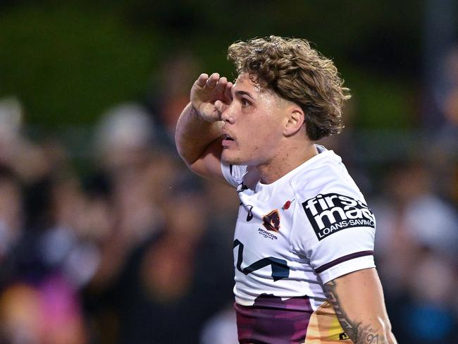 SYDNEY, AUSTRALIA - APRIL 27: Reece Walsh of the Broncos celebrates scoring a try during the round eight NRL match between Wests Tigers and Brisbane Broncos at Campbelltown Stadium, on April 27, 2024, in Sydney, Australia. (Photo by Izhar Khan/Getty Images)