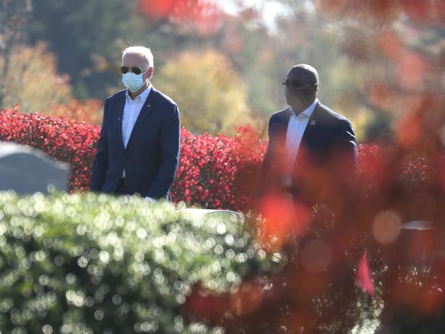 Joe Biden visited a family gravesite after attending mass. It is understood Biden’s late son, Beau, is buried at the graveyard. Picture: AFP