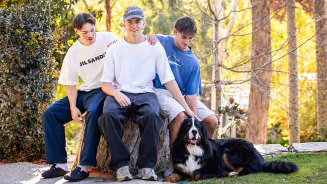 Mates supporting charity, from left Jah Arnold, Max Burton and Joe Ianniello … and Bo the dog. Picture: Tom Huntley