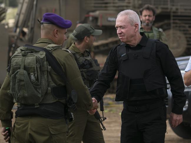 Israeli Minister of Defence Yoav Gallant meets soldiers on the Israeli border with the Gaza Strip. (Photo by Amir Levy/Getty Images)