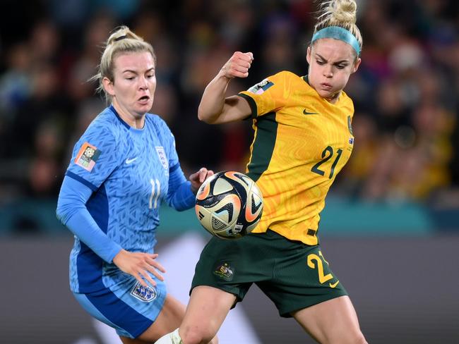 Ellie Carpenter is put under pressure by Lauren Hemp, on her way to scoring the second England goal. Picture: Justin Setterfield/Getty Images