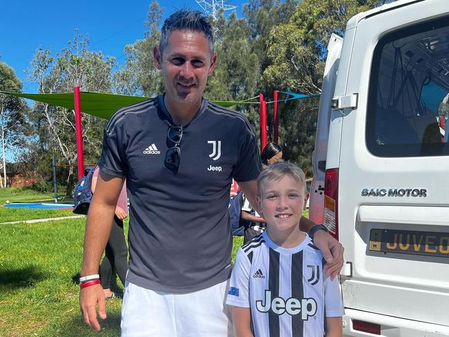 Archie Collins, 11, with Juventus Academy Sydney coach Andrea Merenda (left). Picture: Facebook