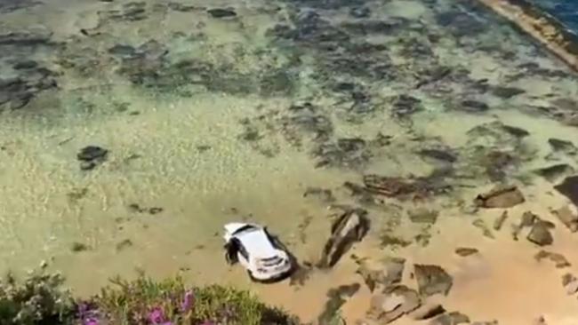 A car has gone over the cliff at Bar Beach. Picture: NBN News