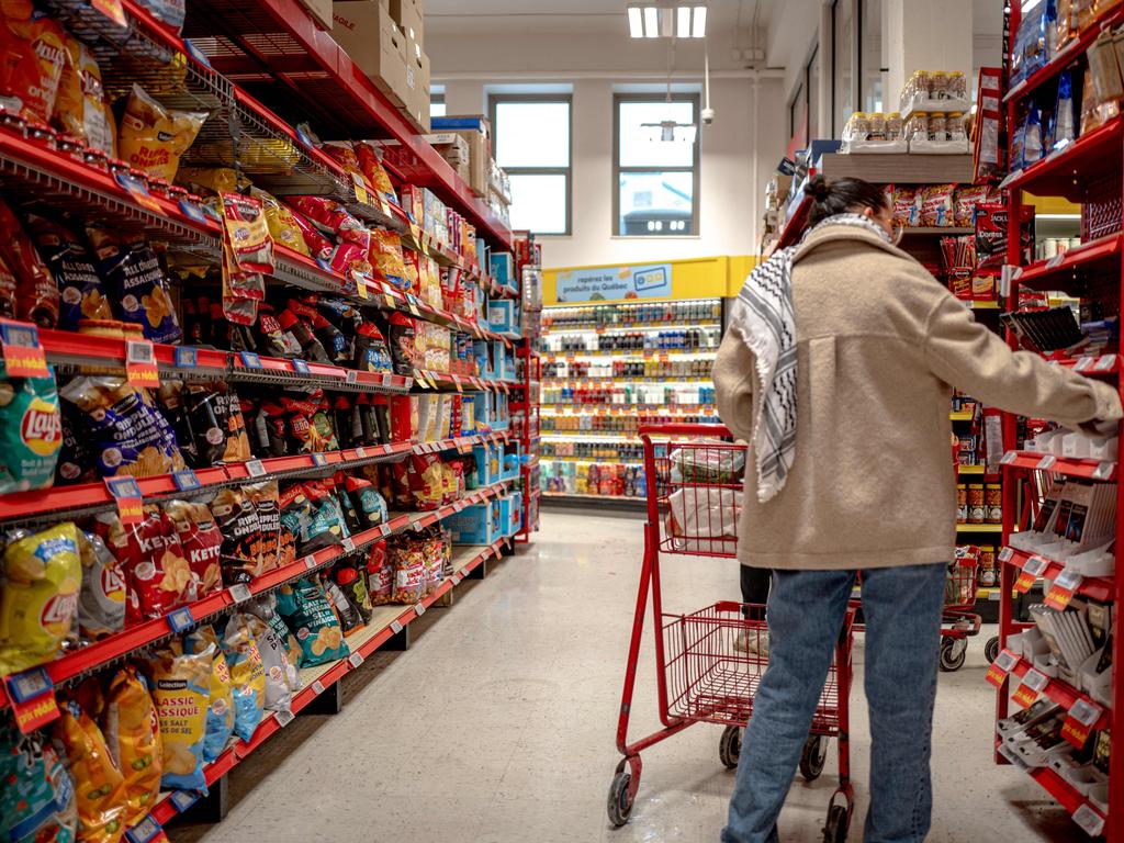 A shopper in Montreal, Canada. Donald Trump had threatened to hit Canadian exports to the US with punishing 25 per cent tariffs before he hit pause. Picture: AFP