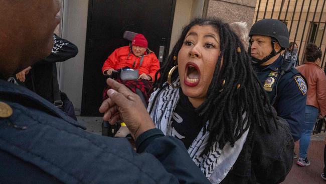 A Pro-Palestine protester is arrested at the gates of Columbia University on Monday in New York City. Picture: AFP