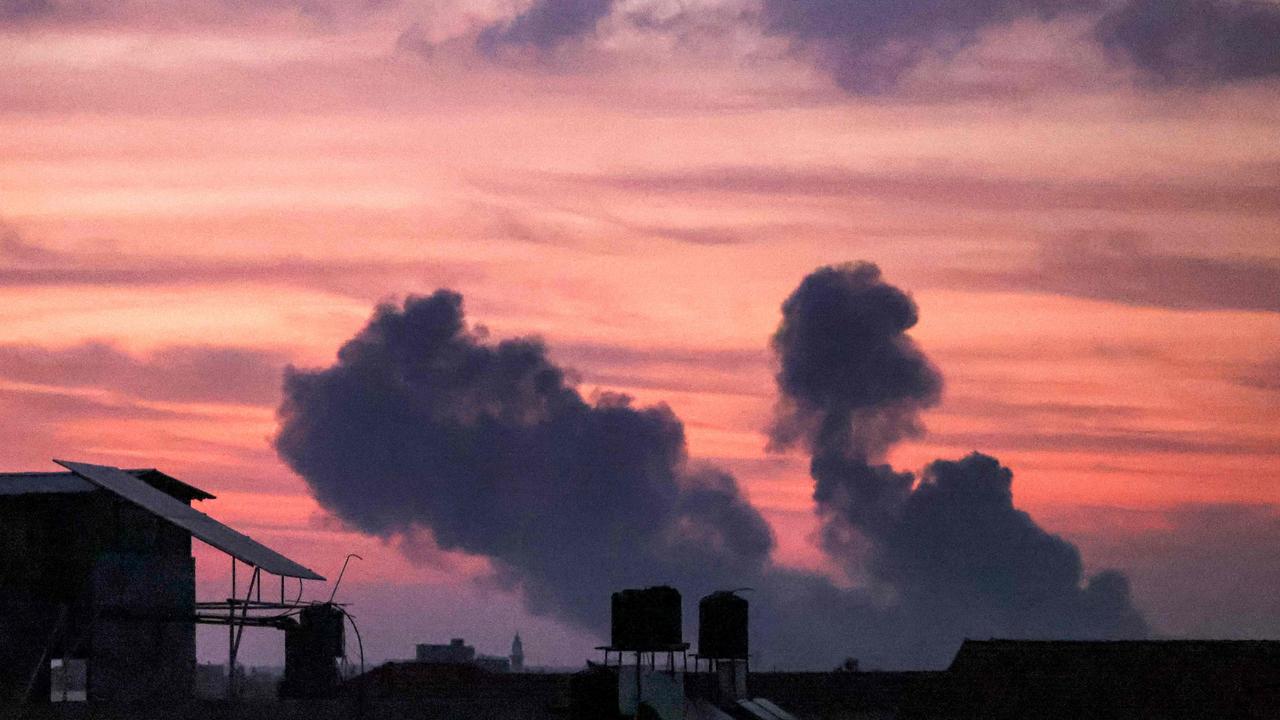 Smoke plumes rise following an Israeli bombardment early on October 11. Picture: Mohammed Abed/AFP