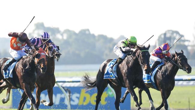 Way Up High (green cap) wins at Sandown Hillside on Saturday.