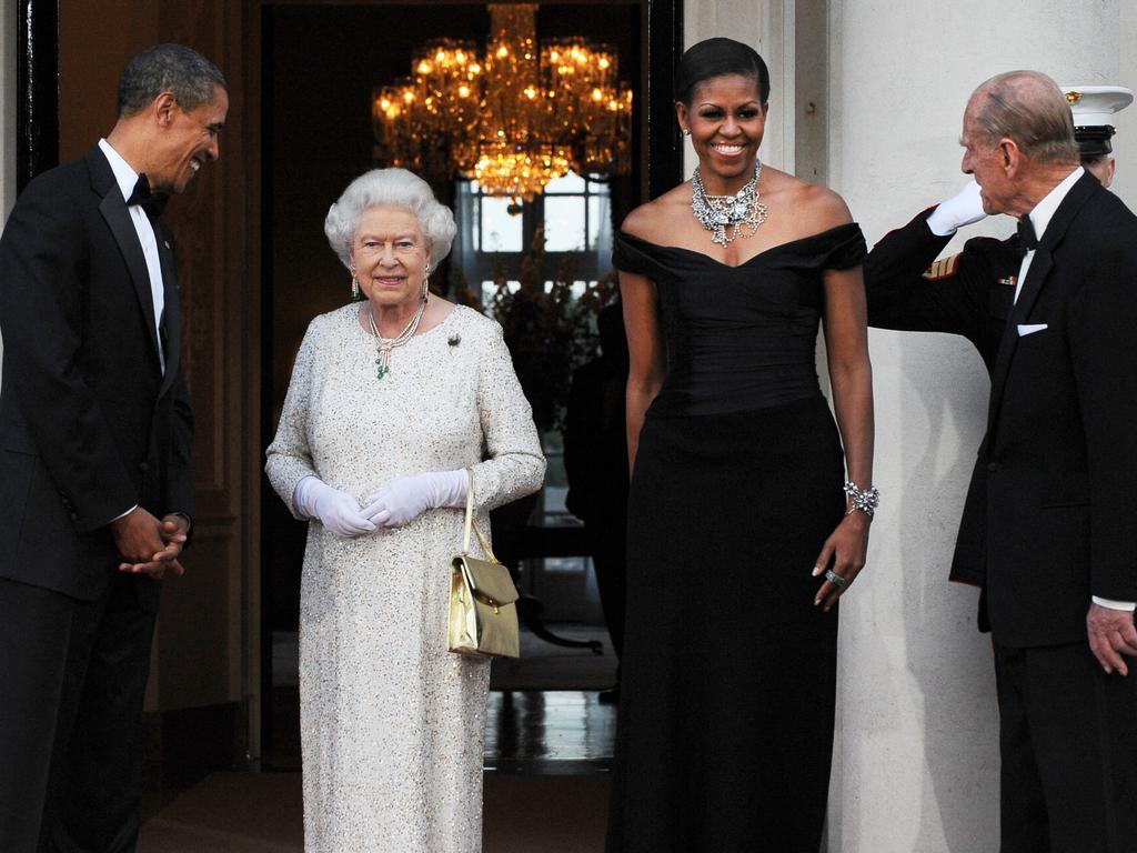 Then-US President Barack Obama and First Lady Michelle Obama with Queen Elizabeth II and Prince Philip during a dinner at Winfield House in London in 2011. Picture: Jewel Samad/AFP