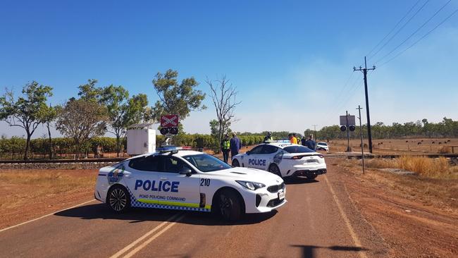 Emergency services at the scene of a bushfire in Livingstone this afternoon. Picture: Che Chorley