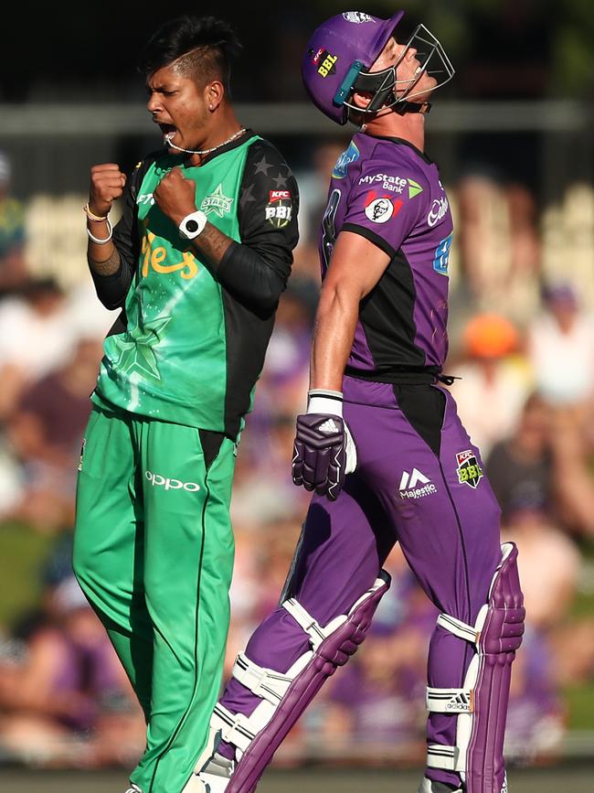 Sandeep Lamichhane of the Stars celebrates taking the wicket of Ben McDermott of the Hurricanes during Hobart Hurricanes v Melbourne Stars Big Bash League Match at Blundstone Arena on December 24, 2018 in Hobart, Australia. (Photo by Mark Metcalfe/Getty Images)